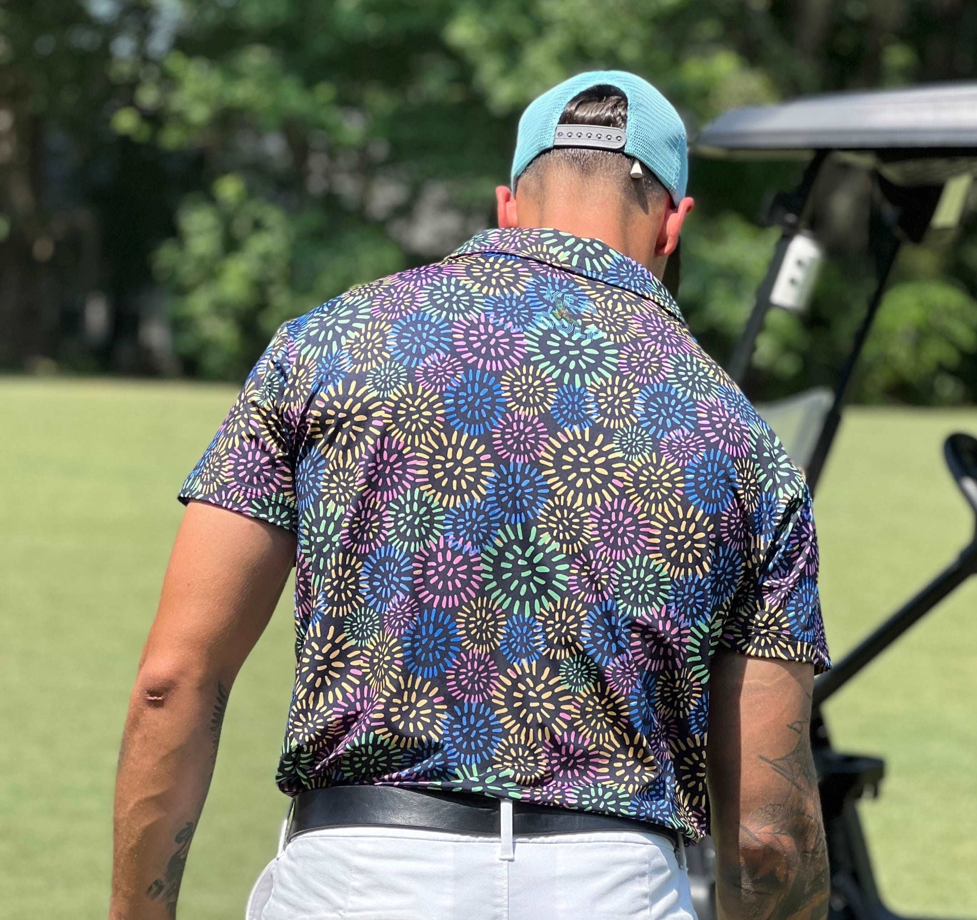multi colored fun golf shirt with dandelions, back of shirt